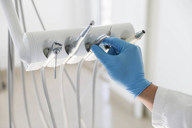 Professional Tooth Extraction technician working in Channel Lake, IL